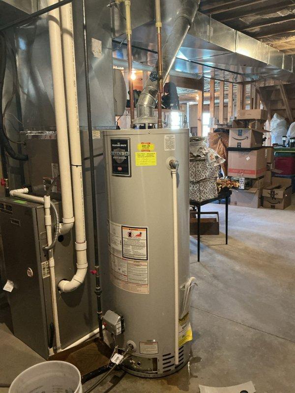 Performed diagnostic assessment on 50-gallon Bradford White water heater exhibiting leakage. Inspected thermostat panel and tank seams, identified source of leak, and implemented necessary repairs to resolve the water leakage issue.