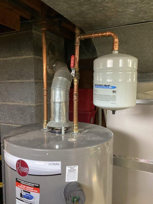 Performed annual heating maintenance on 3-year-old Payne furnace. Completed full tune-up with comprehensive inspection of electrical components and connections. Noted water heater system with Rheem unit and Mainline expansion tank in good working condition; no issues observed with copper piping or ventilation system.