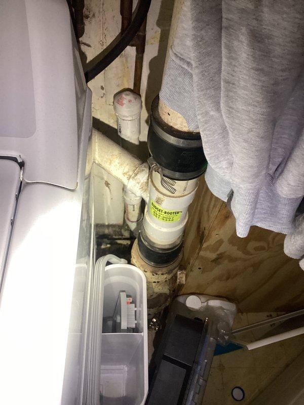 Diagnosed and repaired drain line issue causing toilet to bubble when washing machine discharged. Identified improper venting in the washer drain line as the root cause of the recurring problem. Installed proper air gap and ensured adequate venting to eliminate the negative pressure that was pulling water from the toilet trap.
