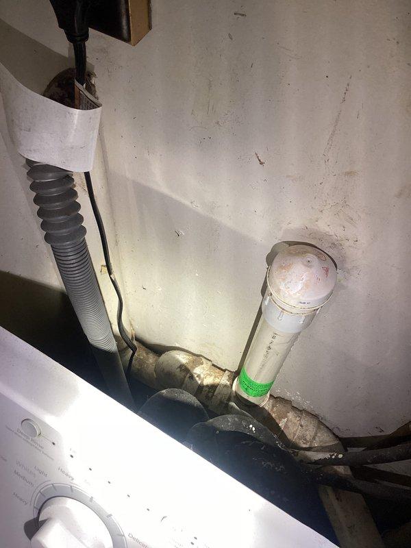 Diagnosed and repaired drain line issue causing toilet to bubble when washing machine discharged. Identified improper venting in the washer drain line as the root cause of the recurring problem. Installed proper air gap and ensured adequate venting to eliminate the negative pressure that was pulling water from the toilet trap.