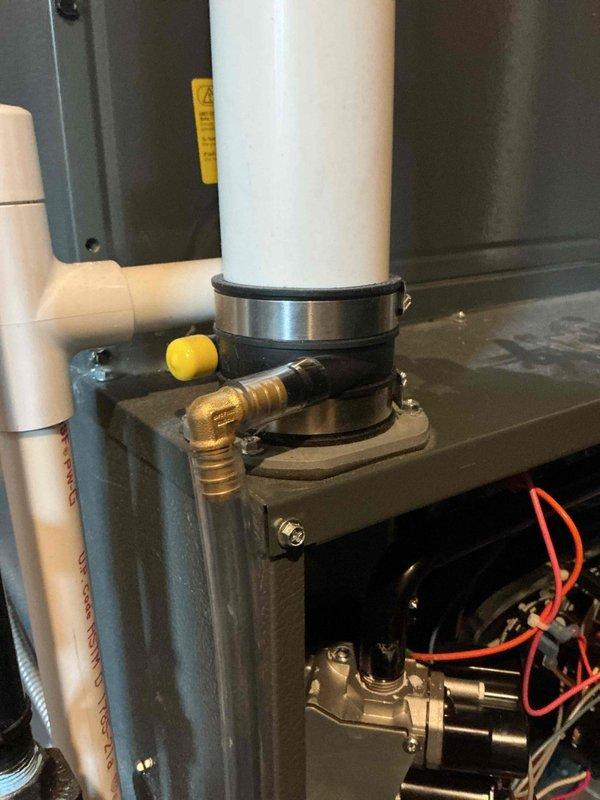 Completed annual heating service on furnace system. Inspected internal components including electrical connections, circuit boards, and drainage system - all found to be in working order with normal dust accumulation. Verified proper installation of PVC venting and condensate lines with no issues identified.