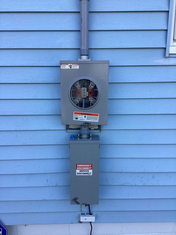 Successfully completed a 100A electrical service upgrade, replacing the existing panel with new equipment mounted on the exterior wall. Installed a dual-compartment service entrance with meter housing and emergency disconnect. Interior panel was rewired with properly organized circuits and new breakers. All work was completed according to code requirements, with appropriate permits secured and final inspection passed.