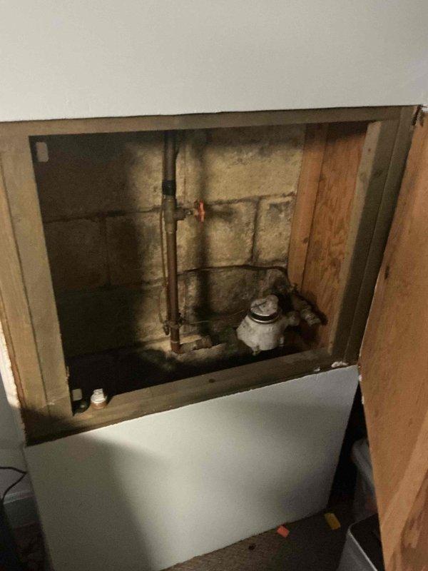 Replaced non-functioning water shut-off valves in the residence. Accessed main water supply through wall panel, disconnected deteriorated valves, and installed new functioning shut-off fixtures to restore proper water control throughout the home.