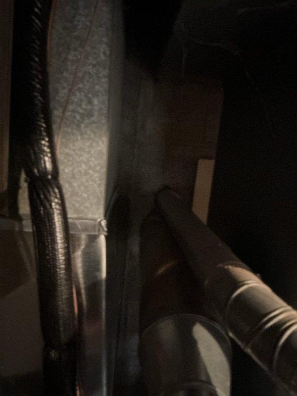 Performed annual tune-up service on a 19-year-old American Standard furnace and 15-year-old Rheem water heater. Noted significant rust formation and deterioration on ductwork components during inspection, with particular attention to corroded circular openings. No humidifier present on the Club Membership account.