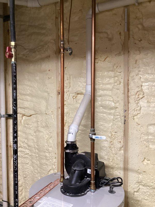Responded to service call for a 6-year-old Bradford White water heater that was leaking from the bottom and not producing hot water. Upon inspection, determined the unit had a tank failure requiring full replacement. Installed new water heater, connected to existing copper supply lines and PVC drain, and verified proper operation before completing service.