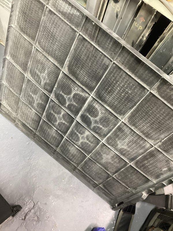 Performed annual heating maintenance on 14-year-old ICP furnace. Inspected system and found extremely dirty air filter with significant buildup severely restricting airflow. Replaced filter to restore proper system operation and efficiency.