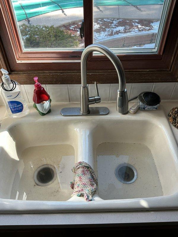 Responded to customer call regarding leaks in bathroom sink and kitchen sink. Performed inspection of both fixtures and identified faulty seals at connection points. Completed repairs by replacing gaskets and tightening connections at both locations, then tested to confirm proper function with no further leakage.