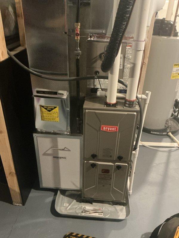 Completed annual heating maintenance on 9-year-old Bryant furnace with attached GeneralAire humidifier. Performed standard FURN tune-up with no issues found. System is operating correctly with expected service life until 2026.