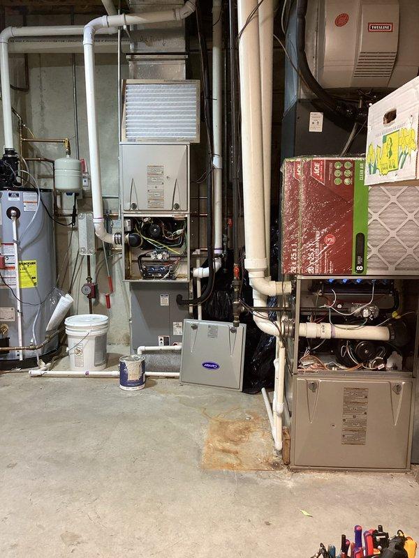 Performed annual heating maintenance on 6-year-old Carrier furnace (Model WT 10-2029). Completed comprehensive tune-up including inspection of all components, filter replacement, and operational testing. System functioning properly with no humidity issues observed; no repairs needed at this time.