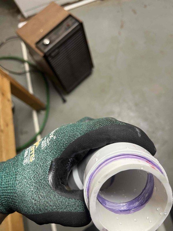 Fixed leaking exhaust pipe on Energi 2 pipe 90+ furnace. Applied PVC primer and sealant to compromised connection point. Verified proper drainage and confirmed furnace is now operating correctly without water leakage.