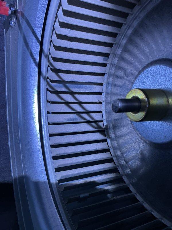 Performed complimentary annual tune-up on 2-year-old EnergiAir WT 08-2033 furnace that was operating normally. Inspected and cleaned blower wheel assembly. Removed and examined housing components and verified proper operation of the system. Documented work with photographs of key components for service records.