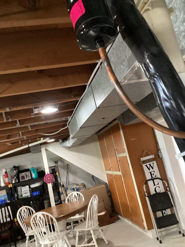 Successfully completed installation of an Amana furnace system in the basement utility area, including proper connection of metal ductwork, PVC condensate lines, and vertical vent piping. System was tested for proper operation and all safety protocols were followed per manufacturer specifications.