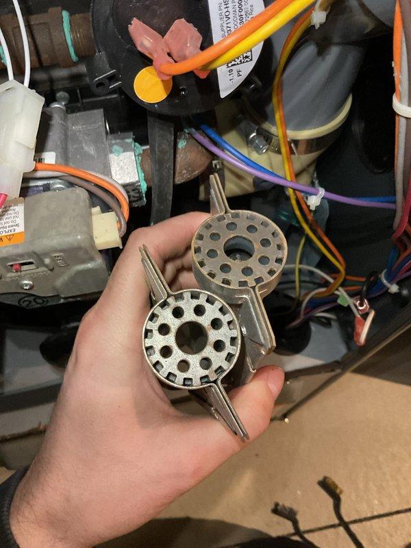 Performed complimentary annual tune-up on 15-year-old Amana furnace. Removed and inspected flame sensor components showing normal oxidation. All electrical connections were checked and secured. System is functioning properly with no issues identified.