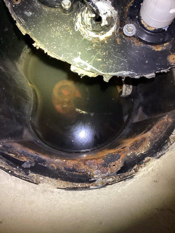 Responded to service call for non-functioning sewage ejector pump float in basement pit. Upon inspection, found significant corrosion and degradation of the float mechanism while the pump motor remained operational. Replaced the defective float switch assembly, verified proper cycling of the pump, and tested system functionality before completing the service.