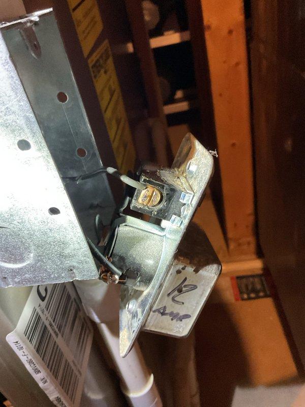 Completed annual heating tune-up on 16-year-old Carrier furnace with attached humidifier. Identified and documented active leak from humidifier unit. System is paired with 1-year-old EnergiAir air cleaner (model WT 12-2034). Photographed installation components showing normal wear on mounting hardware and condensate drainage system for documentation.