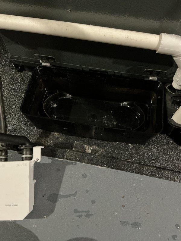 Performed annual maintenance on EnergiAir furnace (model WT 02-2034). Identified and cleaned stagnant water and debris accumulation in the condensate drain pan. Restored proper drainage function to prevent potential water damage and system inefficiency.