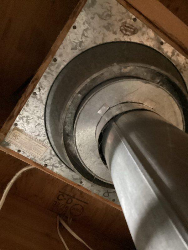 Completed annual heating maintenance on two Ruud furnaces (14yr) and two Carrier humidifiers (15yr) with Comfort Manager installed in 2020. Inspected water heater system with proper venting and connections, and examined HVAC ductwork penetrations through wooden framing, confirming all components are functioning properly.