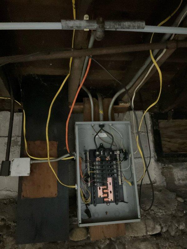 Inspected electrical system after client reported concerns about improper ground wire installation following previous plumbing work. Verified and corrected grounding issues on the basement plumbing system, ensuring proper bonding of copper pipes to electrical ground. Additionally, upgraded basement lighting and installed permanent wiring to replace temporary electrical connections, bringing all systems into compliance with current electrical code requirements.
