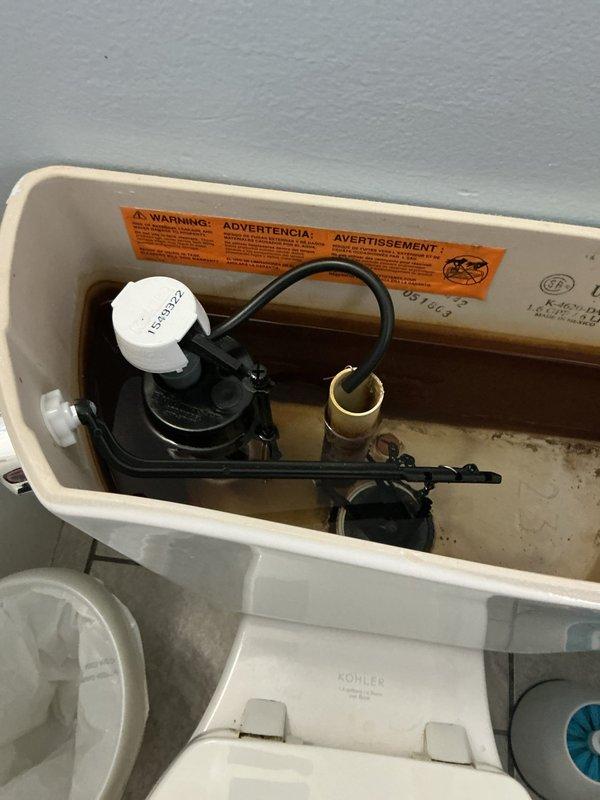 Responded to service call for toilet repair. Inspected Kohler toilet exhibiting flushing issues that had persisted for three weeks. Diagnosed and repaired faulty flush valve assembly, addressing sediment buildup in tank. Customer was advised regarding auto flush conversion kit options for this 60-year-old residential fixture.