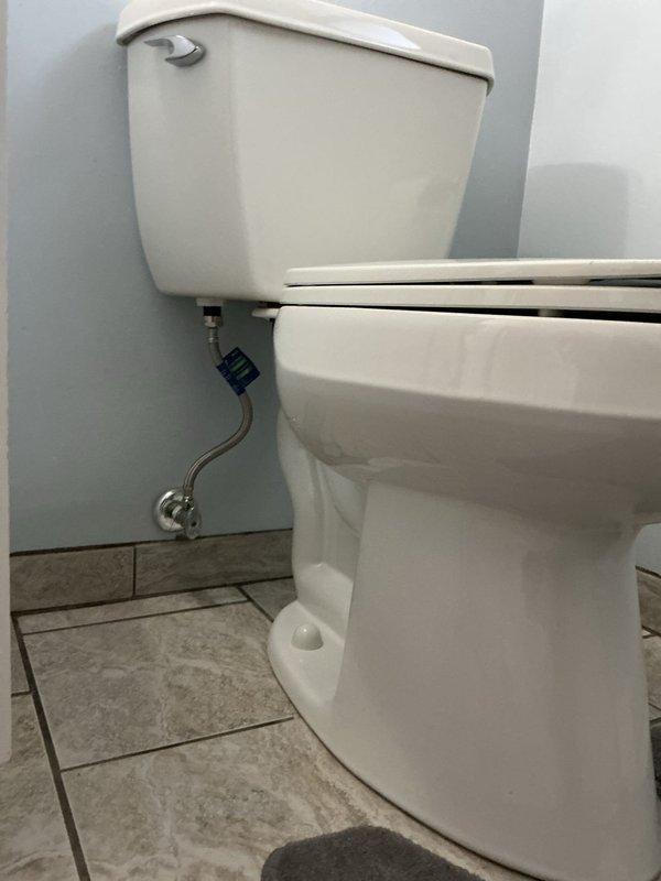 Responded to service call for toilet repair. Inspected Kohler toilet exhibiting flushing issues that had persisted for three weeks. Diagnosed and repaired faulty flush valve assembly, addressing sediment buildup in tank. Customer was advised regarding auto flush conversion kit options for this 60-year-old residential fixture.