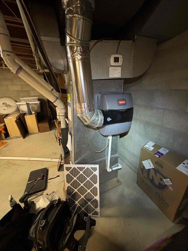 Performed annual maintenance on 7-year-old Daikin furnace system. Inspected heat exchanger for integrity and replaced air filter. Evaluated humidifier unit which customer reported was underperforming; cleaned components and adjusted settings to improve humidity control for winter operation.