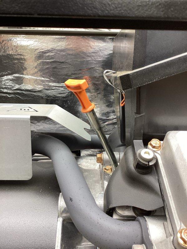 Performed annual tune-up service on Generac generator. Inspected internal mechanical components including fluid systems and connections. Checked oil level with dipstick and verified all hoses, pipes, and fasteners were in good condition with no visible leaks or damage.