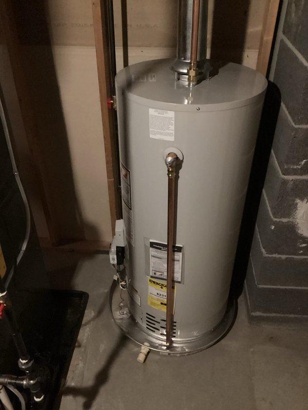 Successfully completed installation of new heating and cooling system including furnace with metal ductwork, air conditioning components, and water heater with proper copper piping connections. All units were professionally mounted with appropriate venting, and system was verified operational with all connections secure and properly insulated.