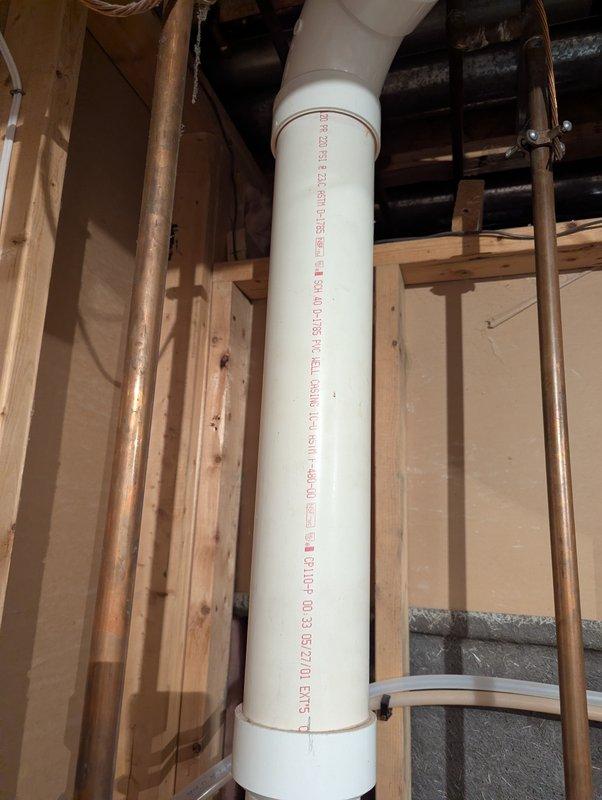 Completed estimate for 75-gallon AO Smith water heater replacement. Inspected existing plumbing infrastructure including PVC drainage/venting system and copper supply lines. Evaluated ceiling area with exposed joists, HVAC ductwork, and utility connections to ensure proper installation requirements for the new unit.