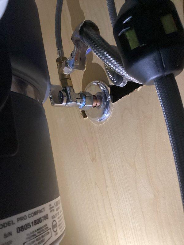 Replaced leaking basement kitchen faucet with new customer-supplied black model featuring high arching neck design. Installed all necessary supply lines and verified proper function with no leaks at connections.