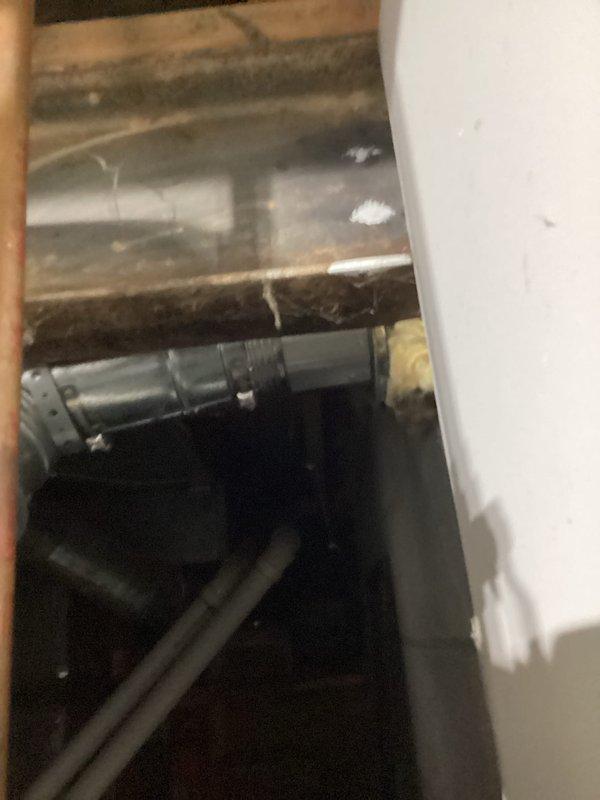 Diagnosed and repaired 3-year-old water heater with heating failure due to faulty valve. Performed comprehensive inspection of unit including ventilation system and surrounding plumbing connections, documenting current installation conditions with photos for service record.