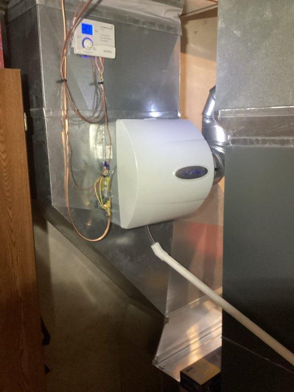 Successfully installed a bypass humidifier on the customer's furnace system as requested. Unit was properly mounted to the side of the air handler with all necessary electrical connections made to the control panel. Verified water supply connection and proper drainage to ensure optimal humidification performance.