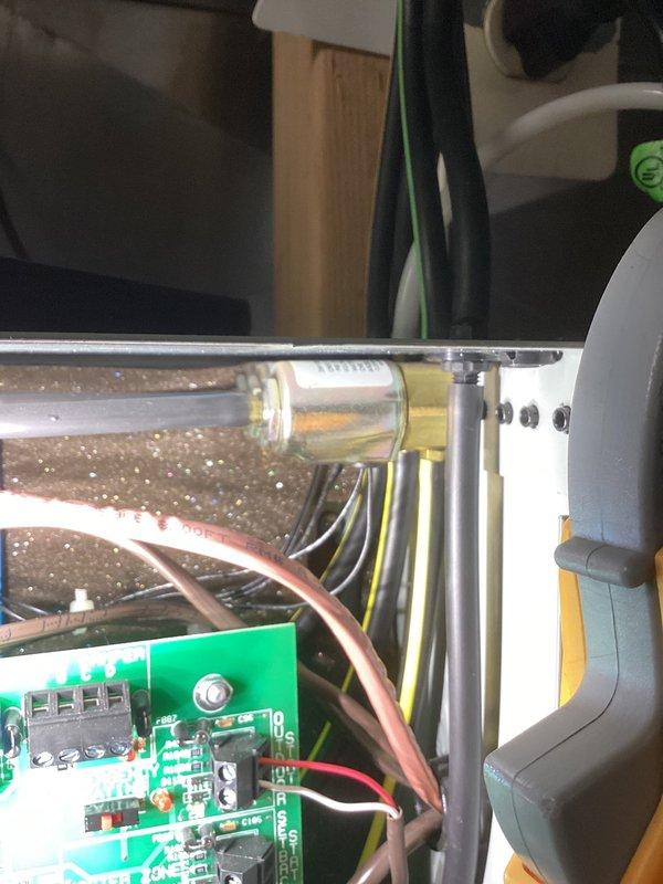 Performed annual heating tune-up on 21-year-old Goodman furnace. Inspected circuit board and electrical connections, finding dust accumulation inside casing. Conducted pressure testing with Testo 510 meter, recording readings of 0.05. Diagnosed airflow issues causing one room to receive no heat while another room had improper return/supply balance. Recommended follow-up for ductwork evaluation.