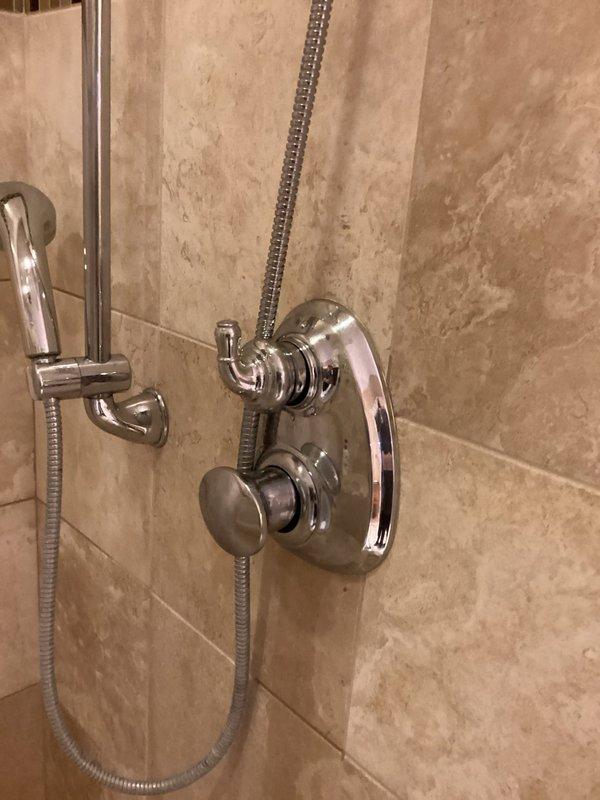 Inspected water heater system in response to customer report of inconsistent water temperatures across multiple fixtures. Examined shower valve and temperature controls which showed no visible damage or corrosion. Identified and adjusted mixing valve settings to ensure proper temperature regulation throughout the home's water distribution system.