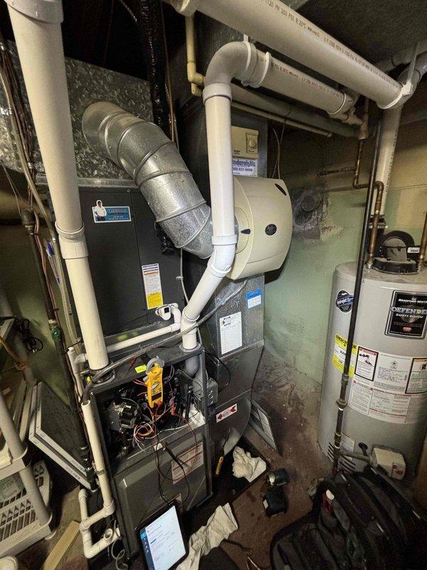 Completed annual heating maintenance on EnergiAir furnace (Model WT 03-2035, 2013 manufacture date) with connected Aprilaire humidifier. Performed comprehensive tune-up including inspection of all components, connections and ductwork, with particular attention to the humidification system as requested. Equipment is functioning within normal parameters and service was documented with photos of the complete HVAC system.