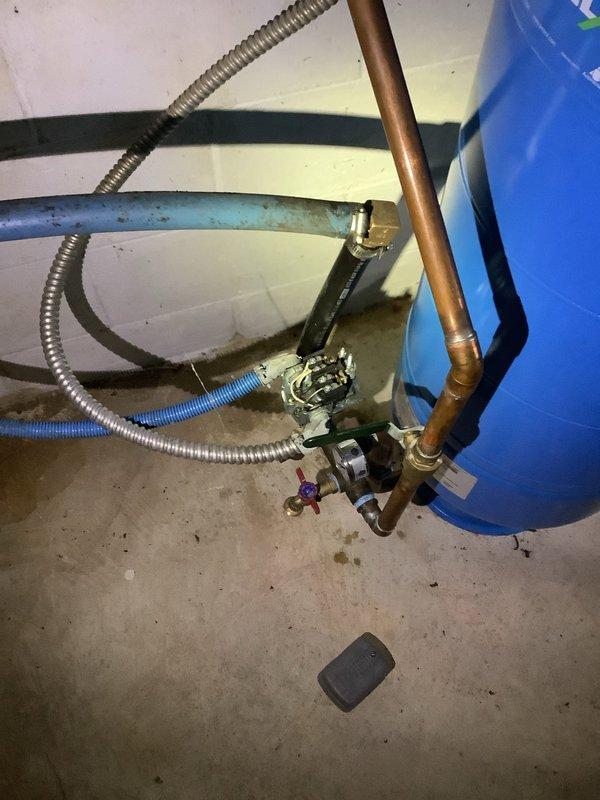 Diagnosed pressure switch on residential well system that was cycling too rapidly due to worn electrical contacts. Removed existing switch and installed new pressure control switch, properly calibrating cut-in/cut-out settings to manufacturer specifications. System now functioning properly with normal cycling patterns.