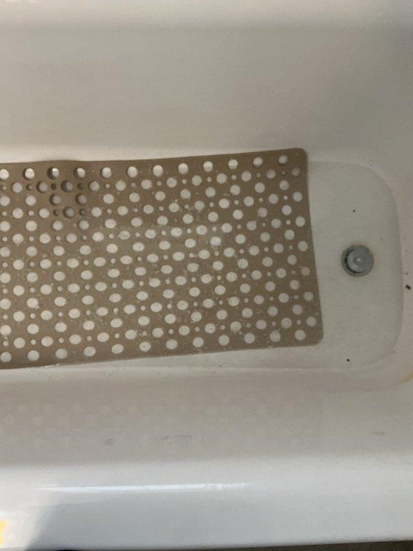 Successfully installed new toilet, connecting supply line to existing shut-off valve and securing unit to floor. Observed bathtub drainage issues and problematic stopper mechanism, which will require separate service appointment for resolution.