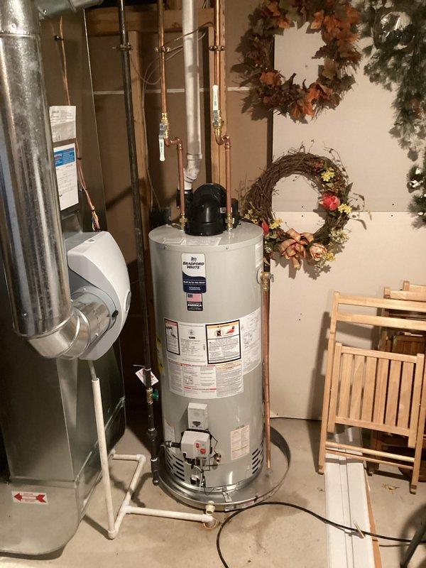 Successfully installed a new 40-gallon, natural gas water heater with power vent and 10-year warranty in customer's utility room. Unit was properly connected to existing copper plumbing lines with appropriate valves and fittings. Complete installation included all necessary safety checks and operational testing.