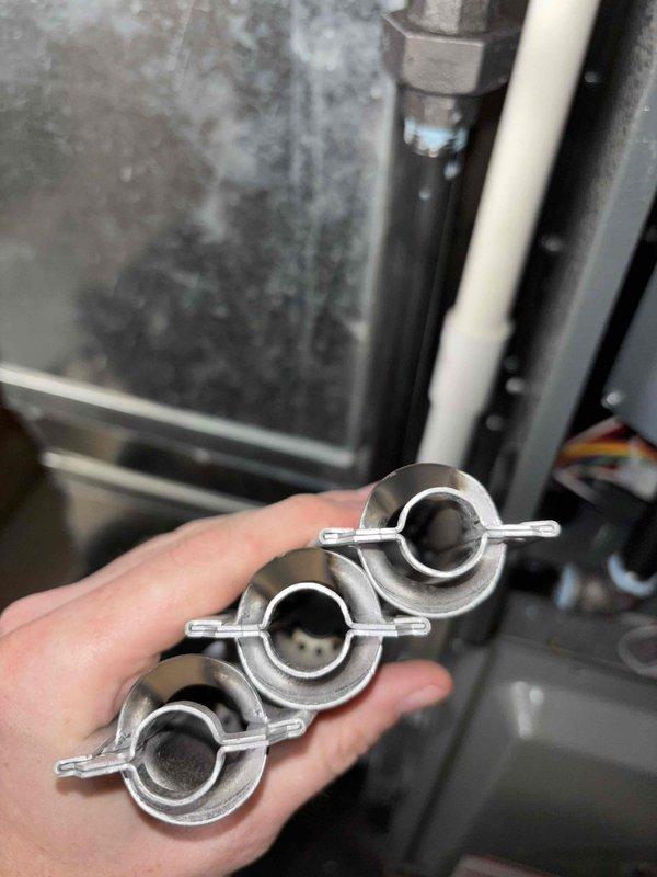 Performed complimentary annual furnace tune-up as part of comfort club membership on EnergiAir WT 01-2035 unit. Inspected electrical connections and secured pipe clamps on system components. System was found to be in good working condition with no issues identified.