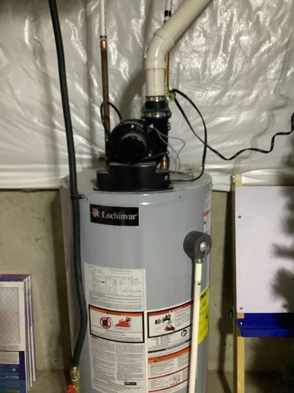 Diagnosed Lochinvar water heater with flashing control valve indicator and unlit pilot. Serviced gas control valve, cleaned pilot assembly, and successfully relit pilot flame. Verified proper heating operation and checked all connections to ensure safe functionality.