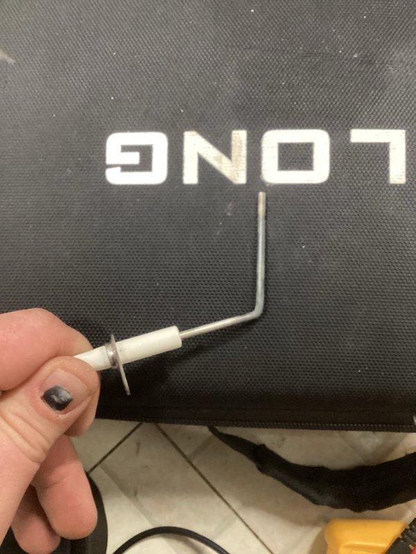 Performed complimentary tune-up on 16-year-old Carrier furnace. Removed and inspected flame sensor, cleaned components, and checked humidifier operation. System functioning properly with clean inspection complete.