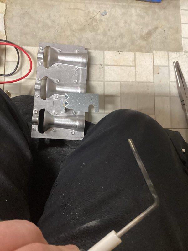 Performed complimentary tune-up on 16-year-old Carrier furnace. Removed and inspected flame sensor, cleaned components, and checked humidifier operation. System functioning properly with clean inspection complete.