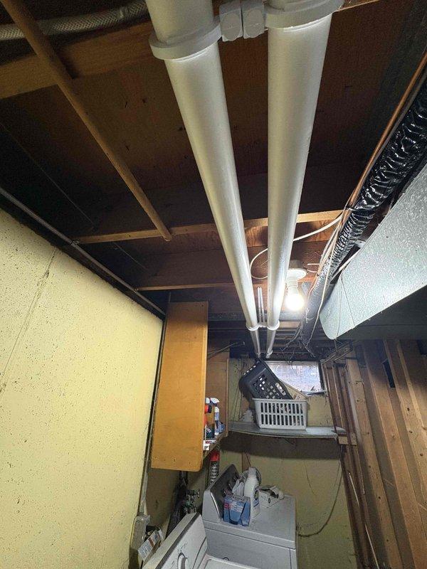 Completed installation of new furnace and AC system in basement mechanical room. Installed new PVC venting for high-efficiency system with proper connections to existing ductwork. System was tested and verified operational with all manufacturer specifications met.