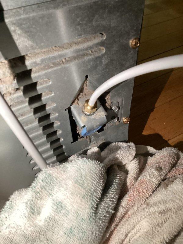 Diagnosed and serviced an iSpring F9K water filtration system that was experiencing severely reduced flow. Replaced primary filter element and discovered issue with refrigerator water line connection. System continues to produce inadequate water pressure despite filter replacement, indicating potential upstream blockage or pressure regulator malfunction. Further service recommended to restore proper functionality.