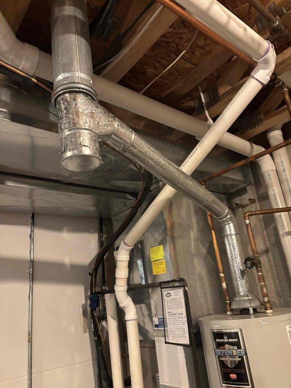 Responded to high carbon monoxide readings in residence. Inspected 10-year-old Carrier furnace and identified improper venting configuration in the flue system causing CO backdraft. Corrected the venting issue by properly sealing and realigning the ductwork connections, then verified safe CO levels throughout the home after repairs.