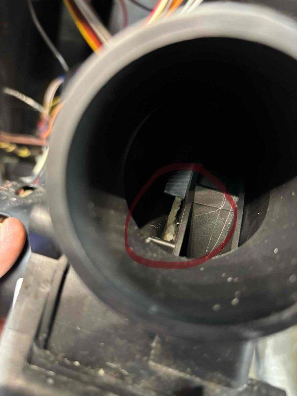 Responded to no-heat call for 7-year-old EnergiAir system (model WT 10-2028). Inspection revealed significant debris buildup in the condensate drain line with a blocked drain trap, causing system shutdown. Cleared obstruction, cleaned trap assembly, and verified proper system operation before departure.