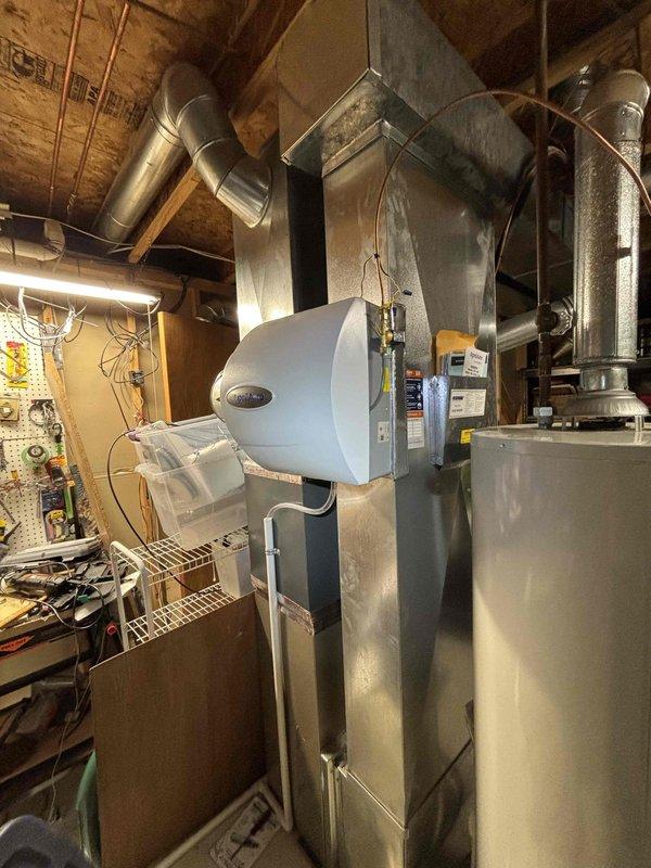 Successfully installed a Carrier manual humidifier model 600 on client's existing HVAC system, mounting the unit on the side of the air handler in the utility room. Completed all necessary electrical connections to the control board, ensuring proper wiring of the humidistat and verifying system functionality before concluding service.