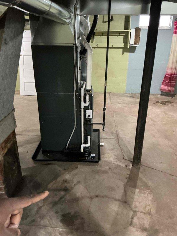 Conducted plumbing project estimate for installation of washer and dryer in basement, which requires relocation of existing attic plumbing vent. Assessment included evaluation of current water heater venting system which needs modification to meet code requirements. Documented existing HVAC setup, water heater configuration, and current plumbing infrastructure with photos to develop comprehensive project plan.