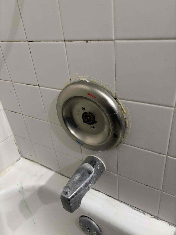 Responded to a no-water complaint affecting the shower. Inspection revealed significant deterioration of subflooring around a PVC water supply pipe with visible water damage. Diagnosed and repaired the shower control valve which showed signs of wear and mineral buildup, restoring normal water flow to the fixture.