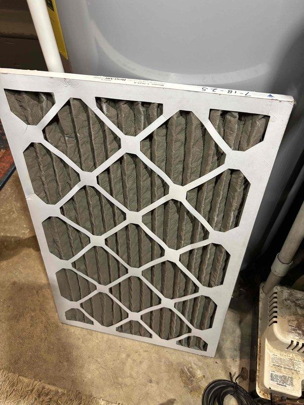 Performed annual heating system maintenance on 10-year-old EnergiAir furnace with integrated humidifier. Inspected and replaced dirty air filter with visible dust accumulation. System is functioning properly with no issues identified during the comprehensive tune-up service.