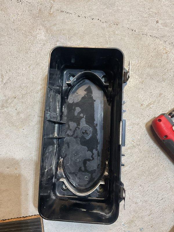 Performed annual heating maintenance on furnace and humidifier system. Removed and cleaned condensate collection container which showed signs of buildup and discoloration. Inspected and cleaned housing component with visible residue and water marks, ensuring proper system operation.